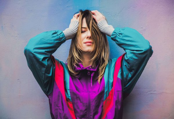 What is the best way to wear a statement coat to work?